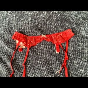 Victoria’s Secret red garter with gemstones